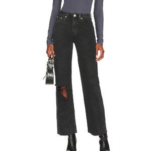 Distressed denim jeans